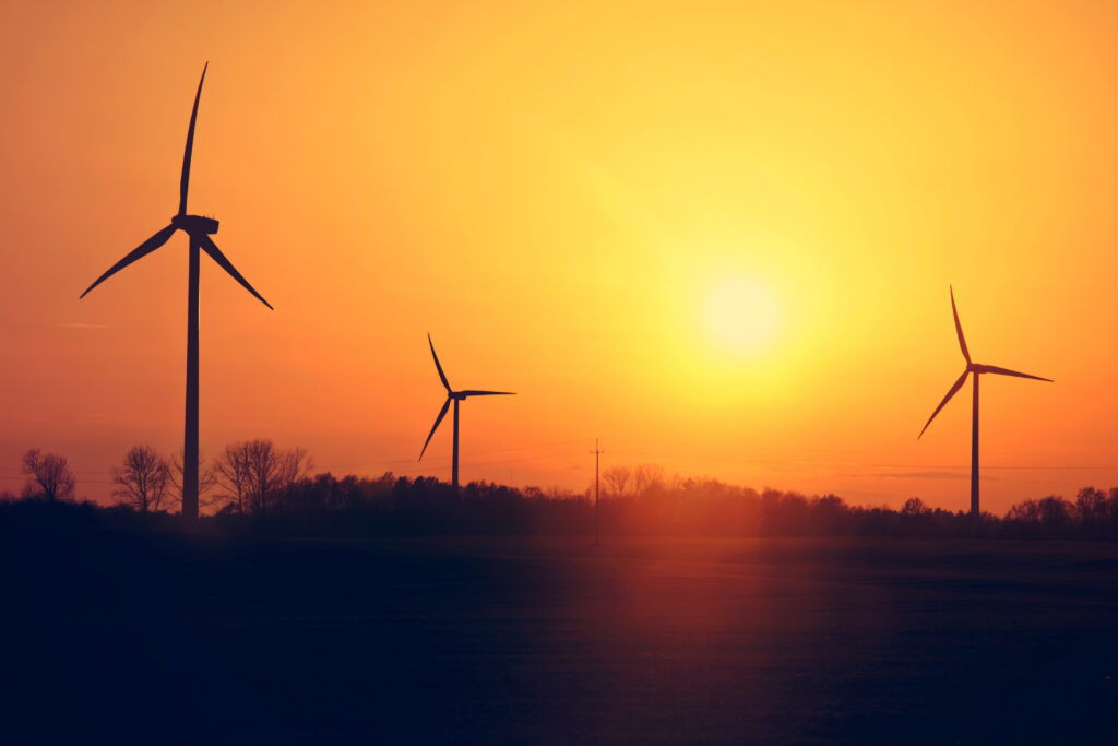 Windmills and sunset.